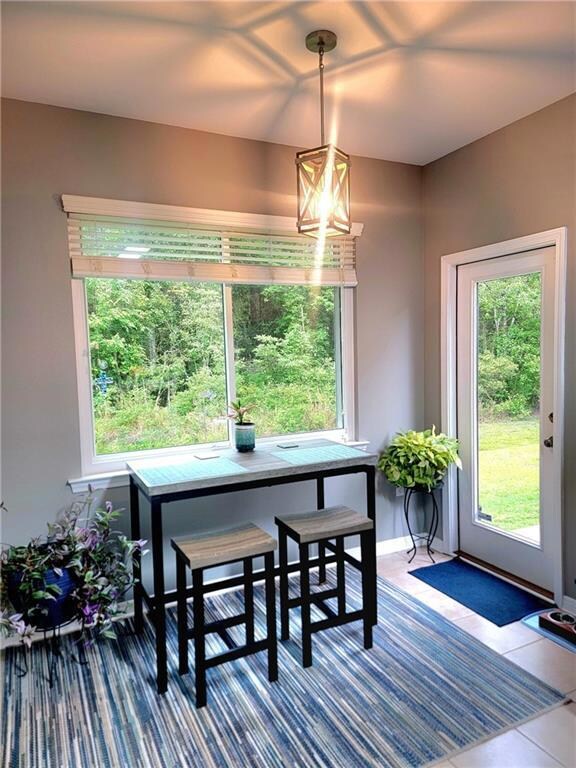 Dining area with a back door. Not all of the townh