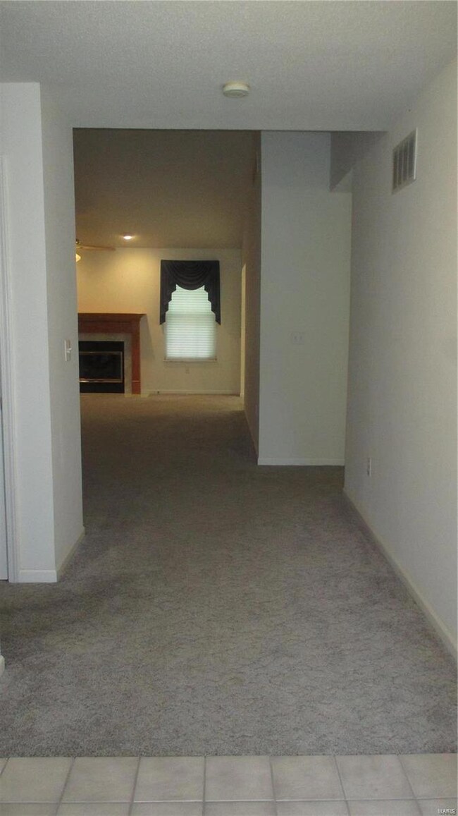 Tile in foyer keep dirt away from carpet.