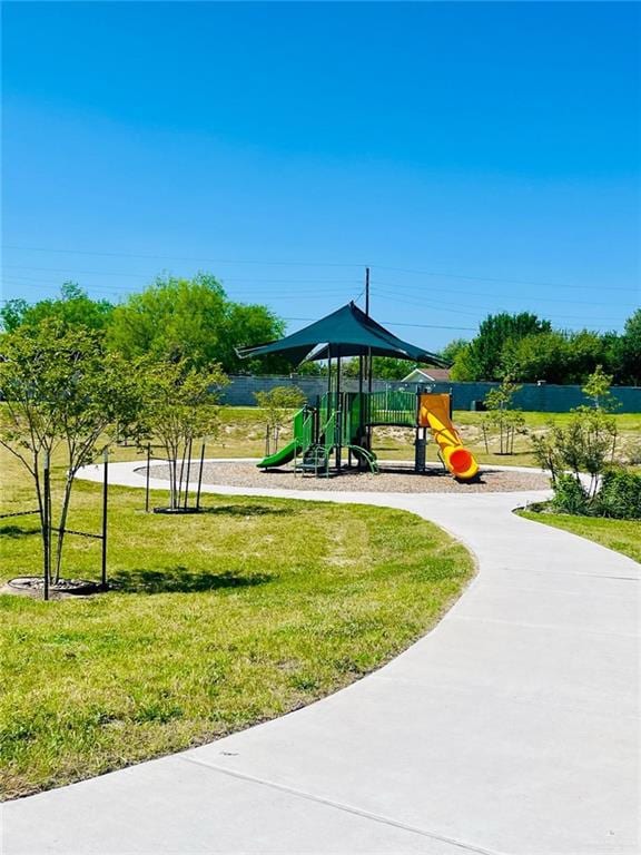 Community playground with a yard