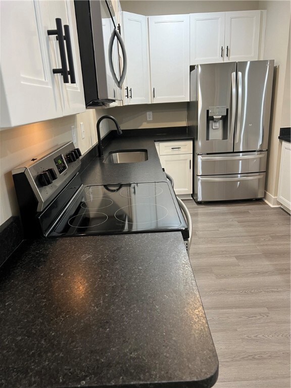 Primary bath with storage granite countertop and l