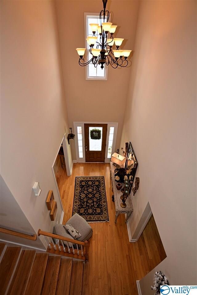 The Foyer ceiling soars to 20 ft and offers a stunning entrance to this beautiful home.