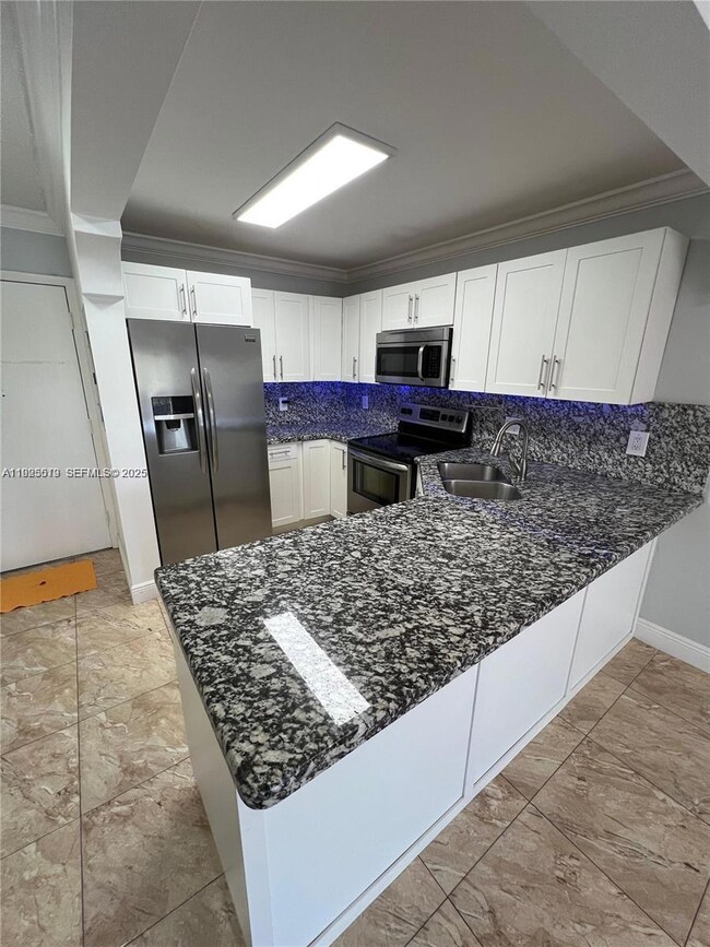 1075 W 68th St unit 218, Hialeah, FL 33014 - photo 2