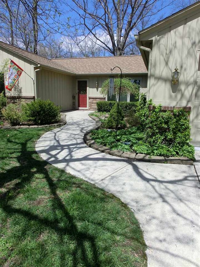 Front entrance with a pleasing curved walkway