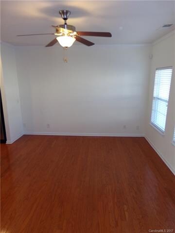 Open floor plan. Wood floors in the living room.
