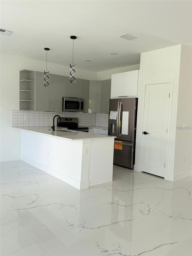 2057 Barroso, Davenport, FL 33837 - photo 6