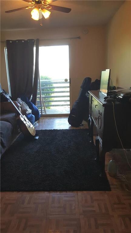 Living room w/door to balcony.  Pergo flooring als