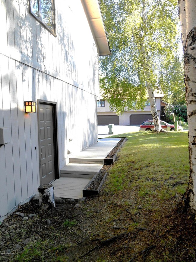 Side entry has private wooden walkway