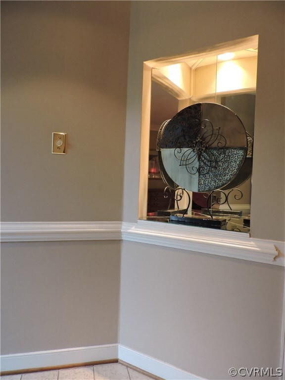 Lighted decorator niche in foyer.