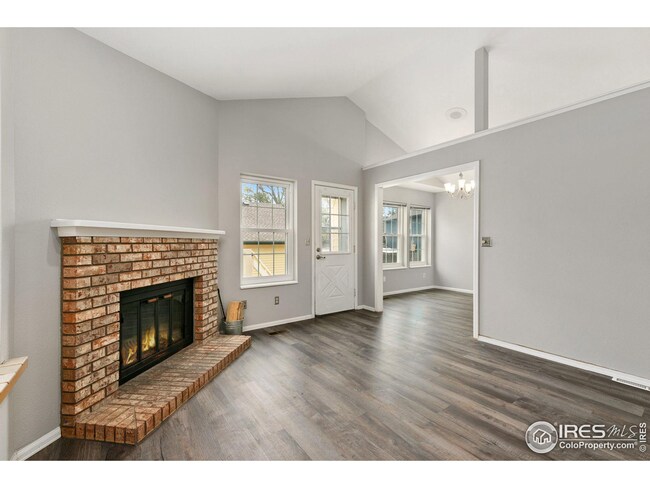 New LVP flooring, updated windows and wood-burning fireplace.