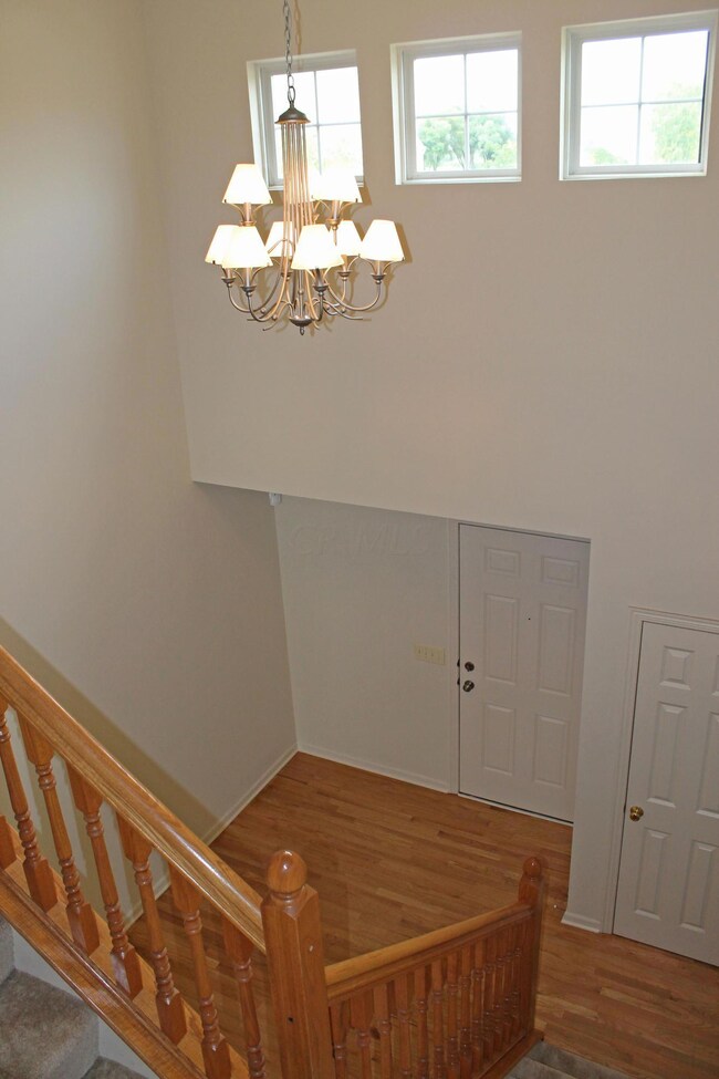 Dramatic 2-story Foyer, hardwood floor
