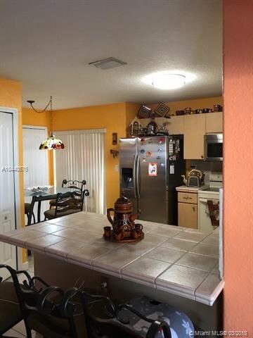ANOTHER VIEW OF THE KITCHEN