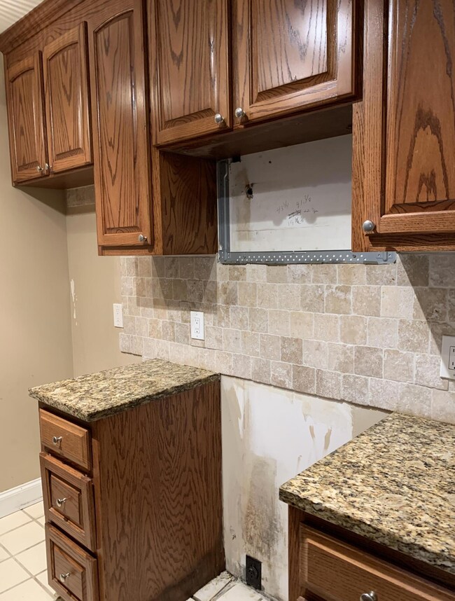 Kitchen Refrigerator and stove side