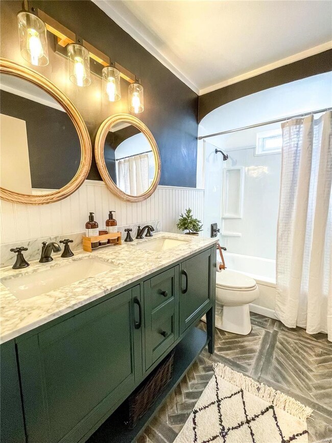 main floor bath offers a double vanity with lots of storage.