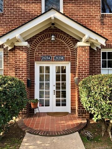 Inviting front entrance leads to the stairwell up 