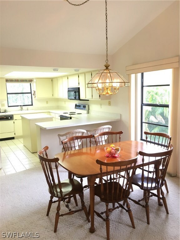 View of the dining room and kitchen