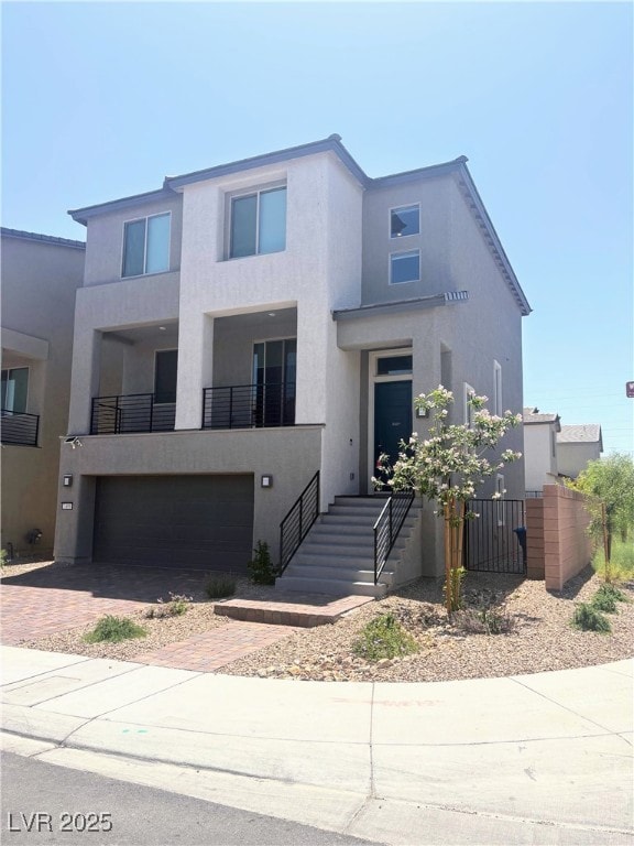 Contemporary house with an attached garage, stucco