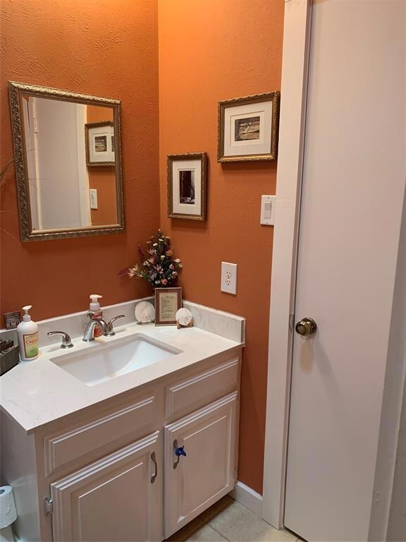 Vanity area that is separate from tub/shower area 