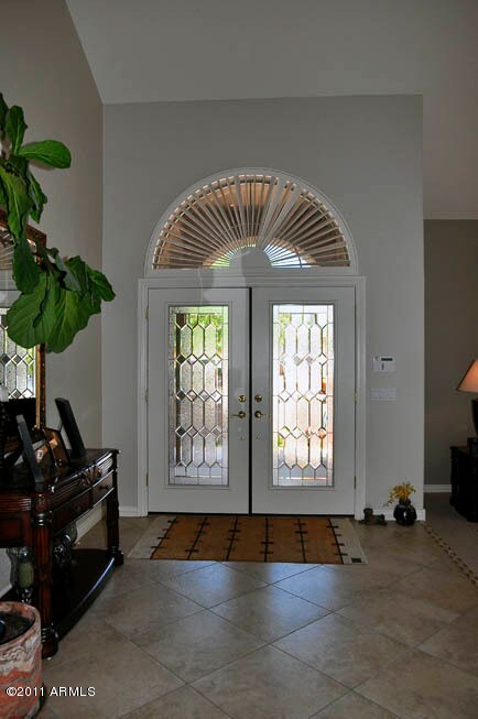 Beautiful Doors and Arched Shutters