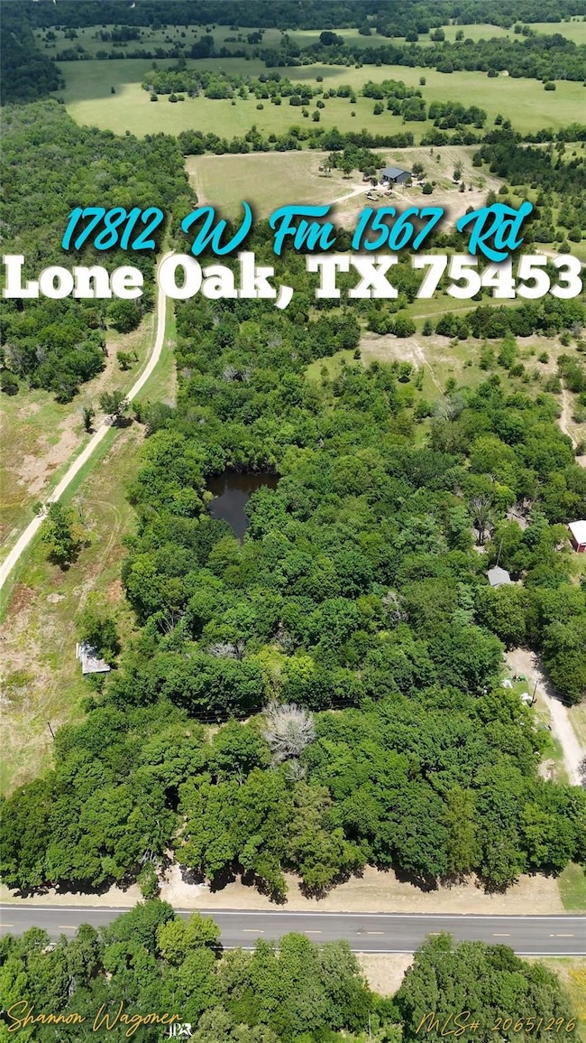 Aerial view with a water view and a rural view