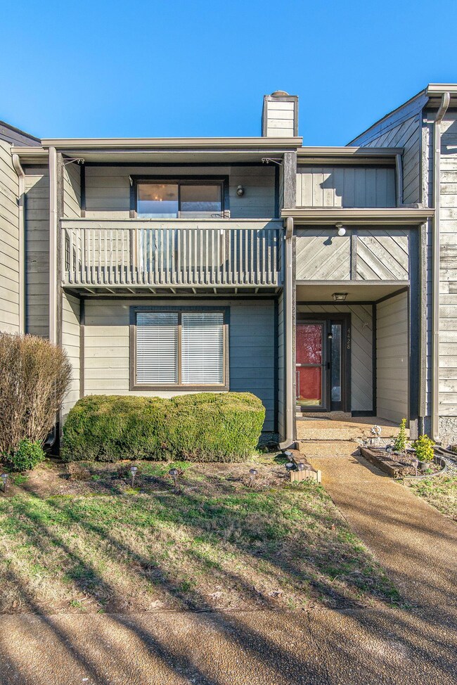 Upstairs Bedroom has a sliding glass door leading outside to the balcony