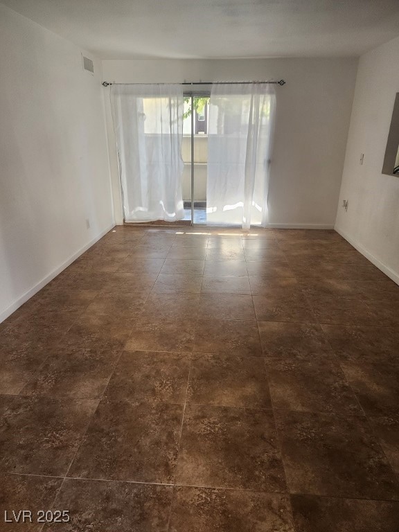 Spare room with baseboards