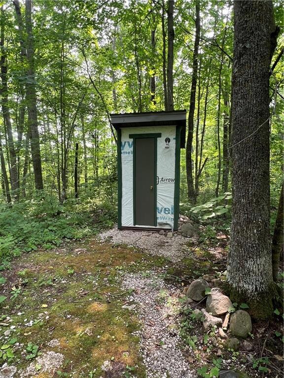 Follow the landscaped path to the privy