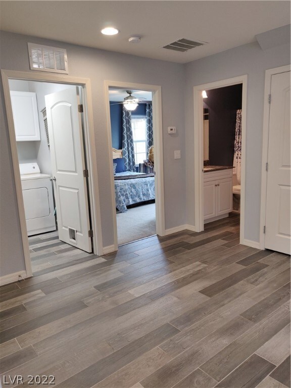 This view shows the bath, third bedroom & laundry