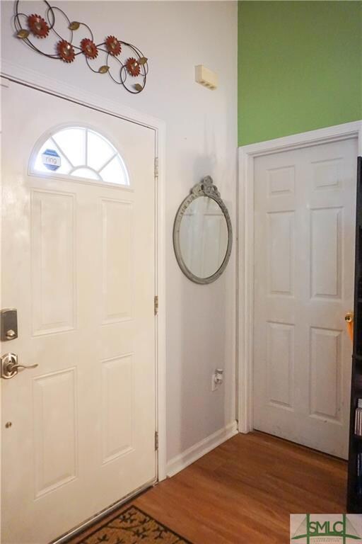 Foyer & Door to Front Bedroom