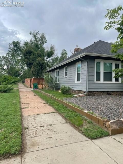Large corner lot with access to the backyard via t