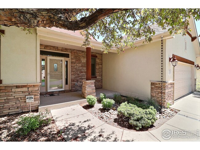 graceful entry with beautiful landscaping