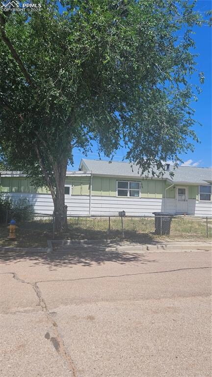 View of front of property.  Home is fully fenced a