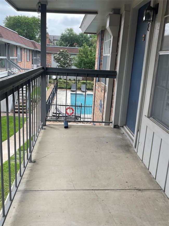 Welcome to 2250 Bering #98—this second-floor walkw