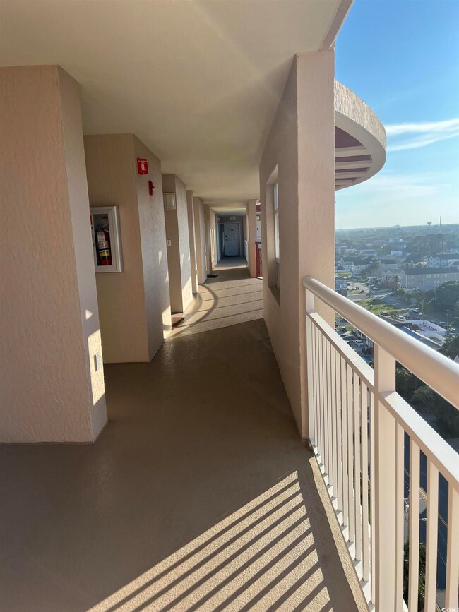 This is a view of the walk from the elevator to the front door of the condo.