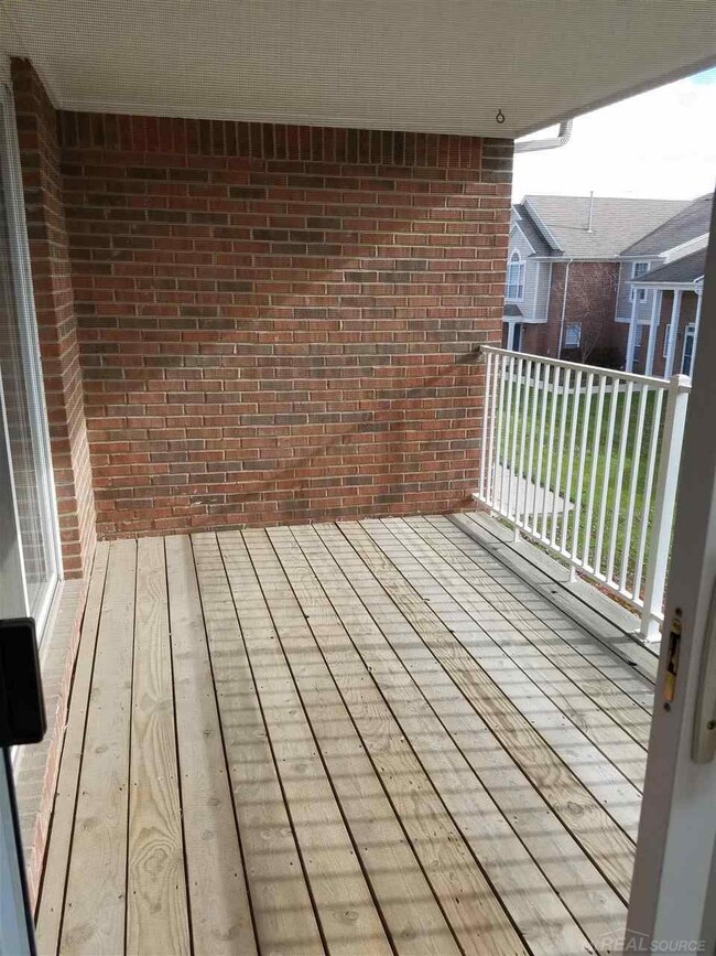 Two door walls to balcony/deck. One from Great Roo