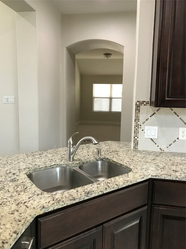 Bar area has seating area for four.