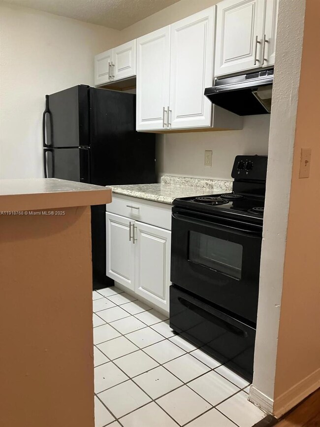 4025 W Mcnab Rd unit E105, Pompano Beach, FL 33069 - photo 4