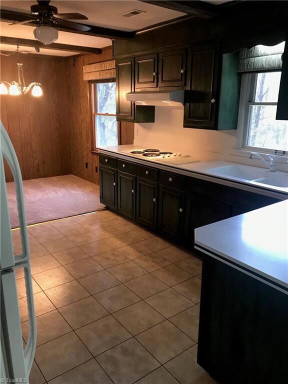 Kitchen Dining area.  Open concept area Great room all open Sunroom, Den Area, Kitchen and Dining.