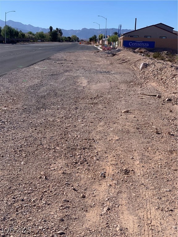 View of yard featuring a mountain view