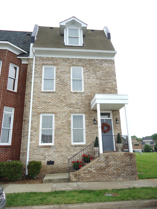 Three story town home in Pleasant View Village. Wonderful walking community