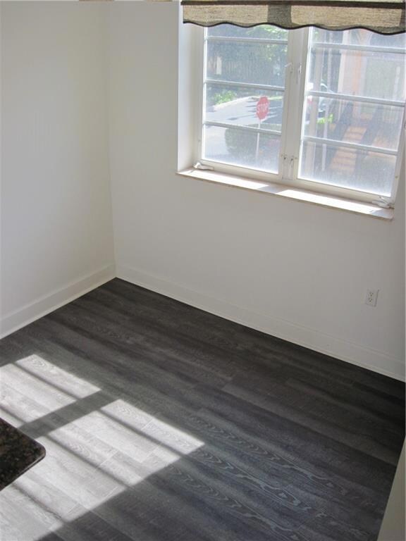 Cozy dining area with plenty of natural light and a sliding door leading to the patio (next image)