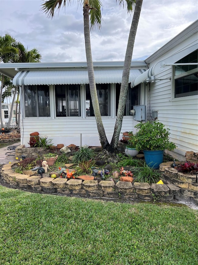 Lots of landscaping, palms and greenery to enjoy!