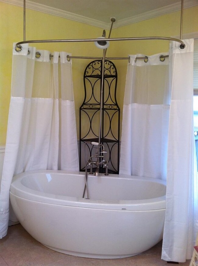 Home spa atmoshpere in huge bath with soaking tub