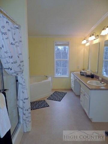 Master Bath: Your private spa with full shower, tw