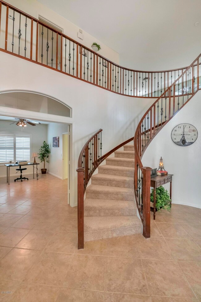 Dramatic Circular Staircase in Entry