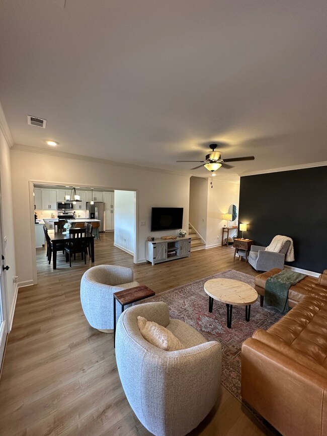 Large living room opens to dining area.