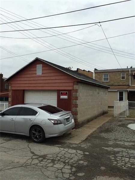 Wow look at this Detached Garage!!  Ample parking 