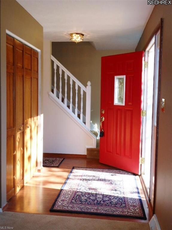 Welcoming Front Entrance with Laminate Flooring