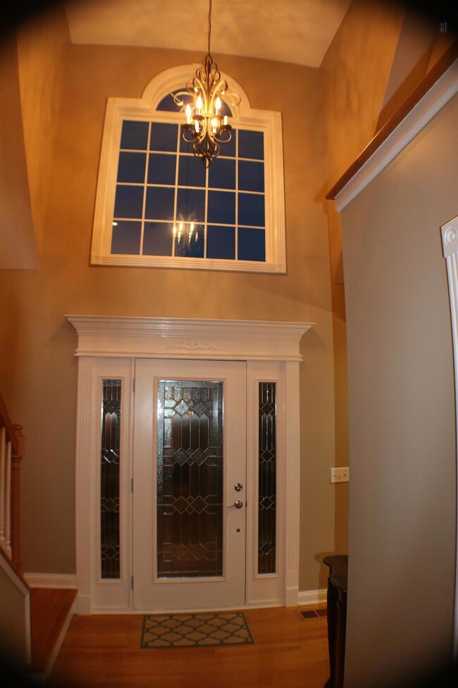 View of Entry Foyer, features half bath for guest. 