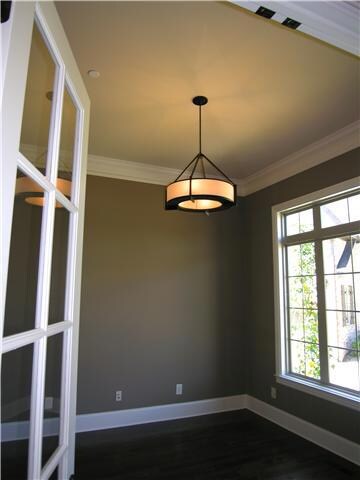 Study with tall ceiling & French doors.