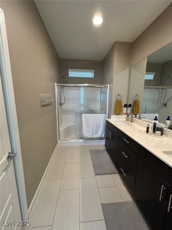 Bathroom with an enclosed shower and double vanity